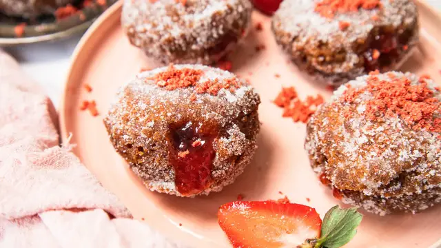Video thumbnail for These Jam-Packed Strawberry Donuts Get An Extra Flavor Boost With A Special Ingredient