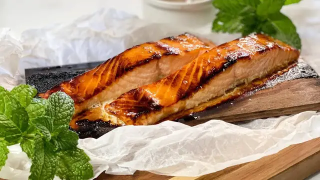 'Video thumbnail for This Smoky-Sweet Maple Plank Bourbon Salmon Will Be Your New Summer Staple'