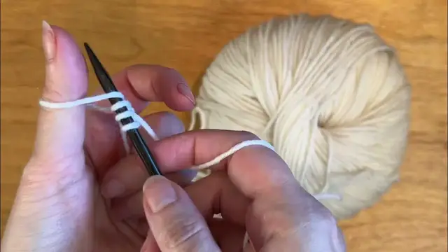 Video thumbnail for Thumb Cast On - eKnittingStitches.com