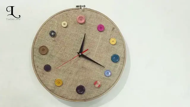 Video thumbnail for How to make beautiful wall clock at home by wasted button, fabric | DIY | craft idea | TubeLife