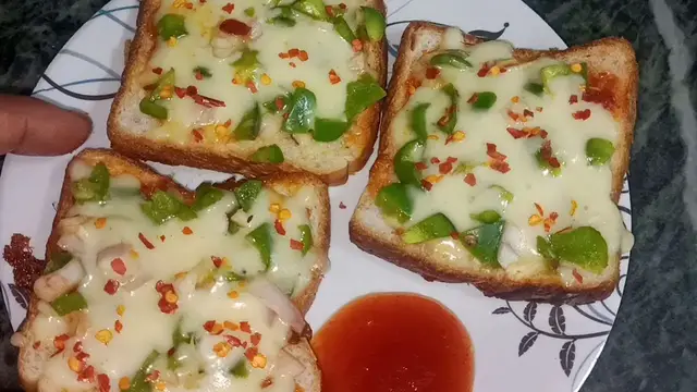 Video thumbnail for Bread Pizza Recipe / Instant Bread Pizza Recipe / How to Make Bread Pizza at Home / Pizza Recipe