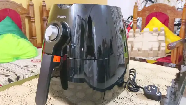 'Video thumbnail for Phillips Air Fryer Review - Enjoy Fried Food with 90% Less Oil'