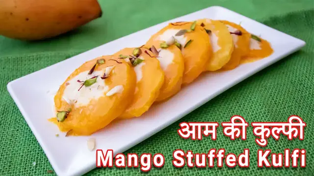 Video thumbnail for Mango Stuffed Kulfi Recipe | आम की कुल्फी |  kulfi in mango shell recipe