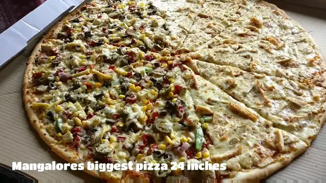 'Video thumbnail for Mangalores biggest 24 inch pizza - La Pinoz Pizza Mangaluru - Simple food'