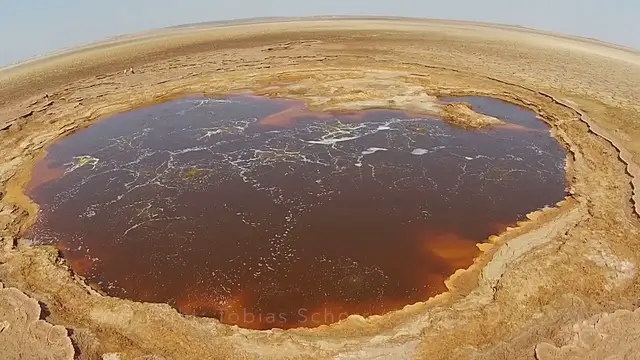 Video thumbnail for The strangest lake in the world - mystery yellow fountains at Dallol's Yellow Lake - aerials