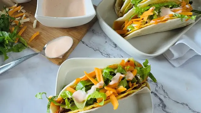 'Video thumbnail for Copycat Taco Bell Cheesy Gordita Crunch Recipe'