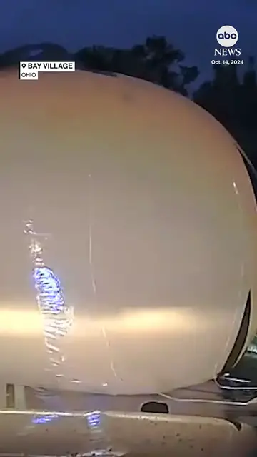 Video thumbnail for Ohio police responding to reports of a runaway pumpkin arrived to find a giant inflatable Halloween decoration blocking traffic.