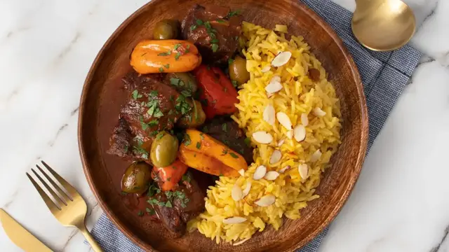 'Video thumbnail for Spanish Beef Tips And Saffron-Almond Rice Recipe'