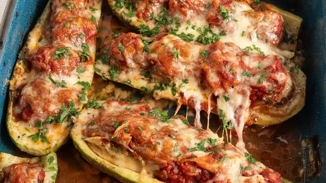 'Video thumbnail for Meatball Marinara-Ish Stuffed Zucchini Boats Recipe'