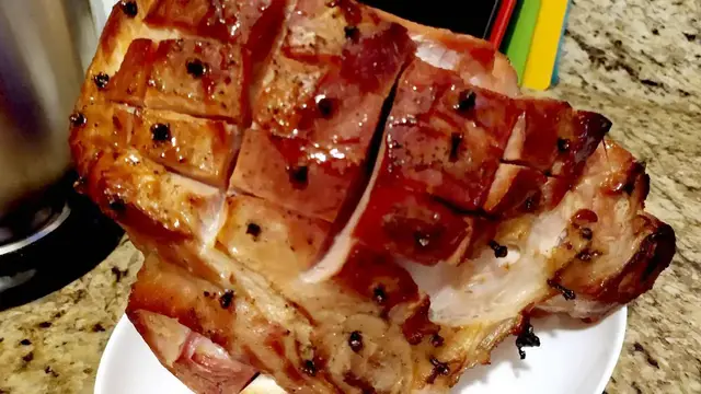 Video thumbnail for Garlic Studded Ham with Cherry Glaze