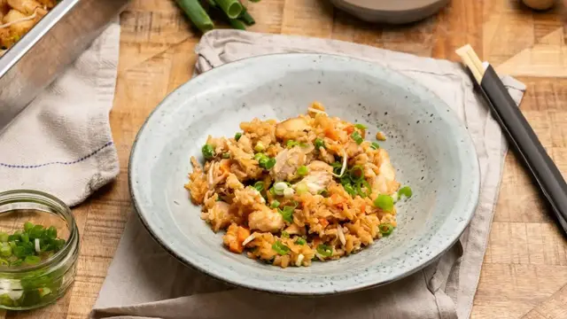 'Video thumbnail for Skip Hibachi And Make Chicken Fried Rice With Just A Sheet Pan'