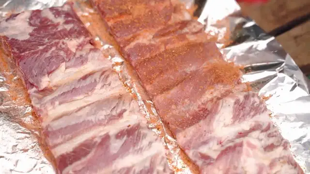 'Video thumbnail for Smoky & Sweet Kansas City Ribs Recipe'