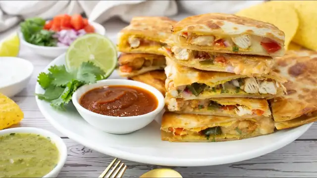 'Video thumbnail for Crunchy, Cheesy, Saucy: These Crunchwrap-Style BBQ Chicken Quesadillas Have It All'