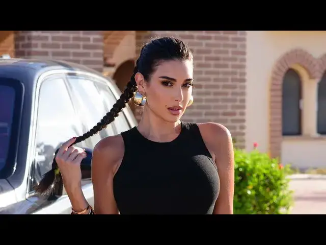 'Video thumbnail for Embrace Elegance with Yasmine Sabri Chic Minimalistic Black Dress'