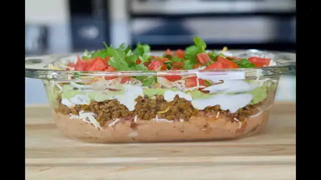 'Video thumbnail for Seven Layer Taco Dip Recipe | How To Make A Taco Dip | SyS'