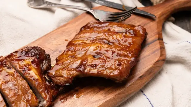 Video thumbnail for Juicy Baby Back Ribs With Honey Bourbon Glaze Recipe