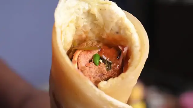 'Video thumbnail for Kolkata-style Chicken Kathi Roll _ চিকেন কাঠি রোল _ चिकेन काठी रोल - by Crispyfoodidea'