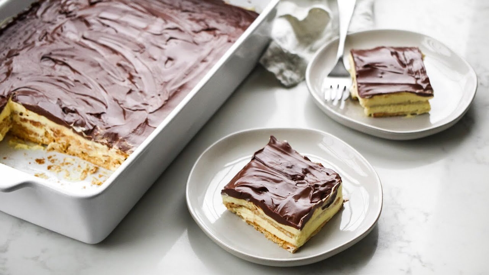 Video thumbnail for No-Bake Chocolate Eclair Cake Recipe