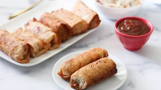 'Video thumbnail for Leftover Pulled Pork Egg Rolls Recipe'