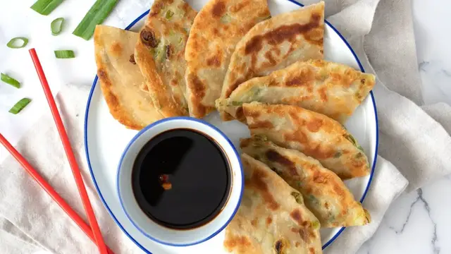 'Video thumbnail for Crispy Flaky Scallion Pancakes Recipe'