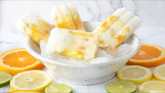 'Video thumbnail for Triple Citrus Yogurt Popsicles Recipe'