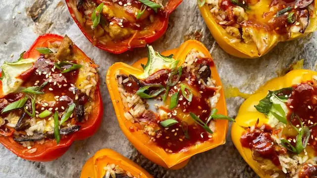 'Video thumbnail for Tofu And Kimchi Bibimbap-Stuffed Pepper Recipe'