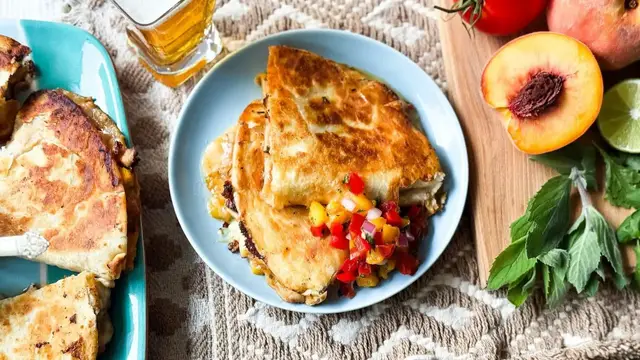 'Video thumbnail for These Peach Chicken Quesadillas Are Deliciously Sweet And Spicy'