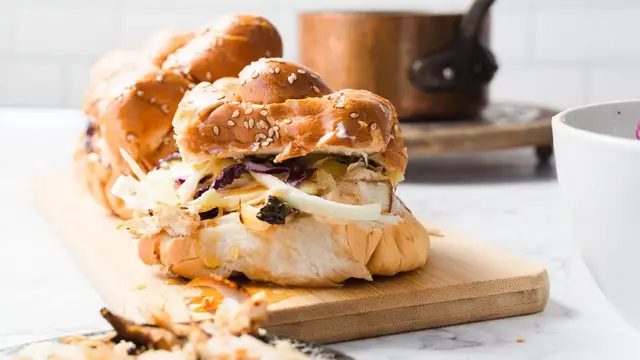 'Video thumbnail for Bourbon Glazed Chicken Sliders Will Be The First To Go At Any Party'