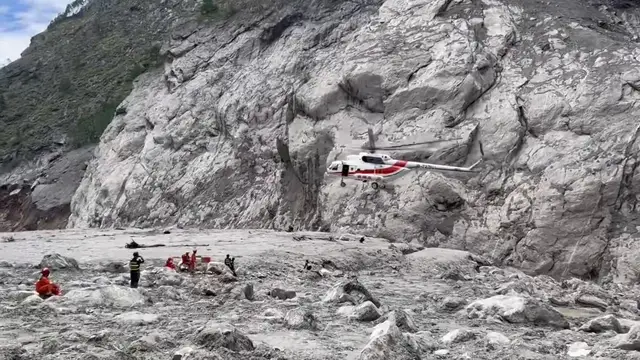 Video thumbnail for China: Rescue helicopters flown into hardest-hit zones of Gyirong Port after deadly mudslide.