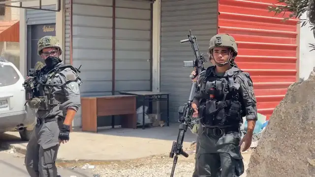 Video thumbnail for Israeli forces raid town near Nablus in occupied West Bank.