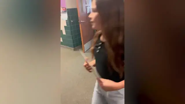 Video thumbnail for Class Hold Up Signs To Help Out With Teacher's Surprise Engagement | Happily TV