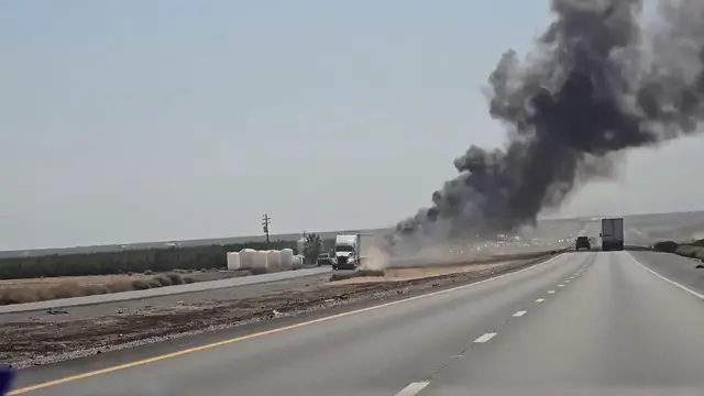 Video thumbnail for US: Amazon Truck Catches Fire on Interstate 5 Near Firebaugh, California.