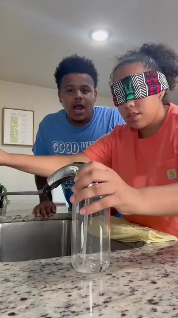 Video thumbnail for Blindfolded Kitchen Water Challenge Ends in Spills