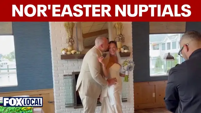 Video thumbnail for Long Island couple braves nor'easter floods to tie the knot