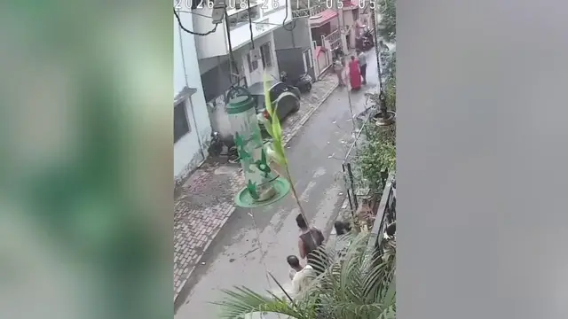 Video thumbnail for India: Stray dog bite leaves woman struggling as toddler slips from her arms, falls onto road during sudden attack.