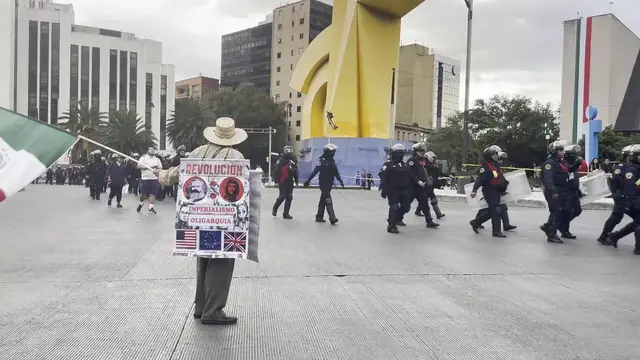 Video thumbnail for Mexico: Mexico March Marks Ayotzinapa Anniversary 15.