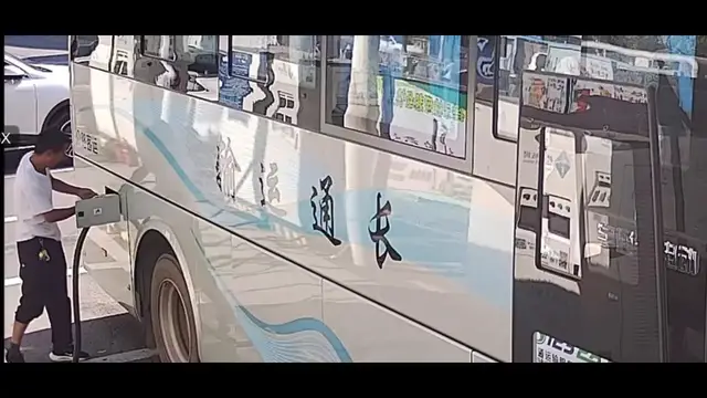 Video thumbnail for China: Charging gun explodes as Chinese man removes it before power is switched off.