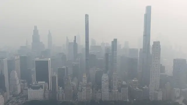 Video thumbnail for US: DRONE - Wildfire smoke from Canada shrouds New York City skyline.