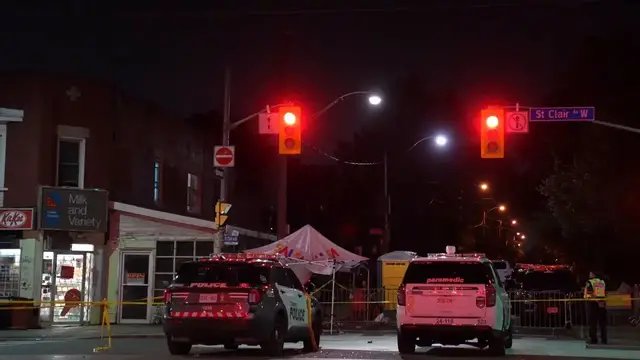 Video thumbnail for Canada: Police secure area after deadly shooting near Toronto street festival.