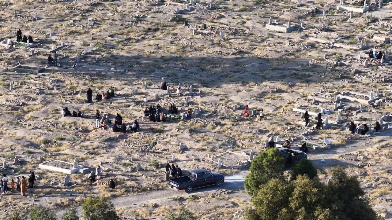 Video thumbnail for Syria: DRONE - Syrians mark Eid al-Adha with mass prayers in Raqqa.
