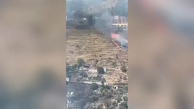 Video thumbnail for Italy: Wildfire threatens homes near Taormina on Italy's Sicily.