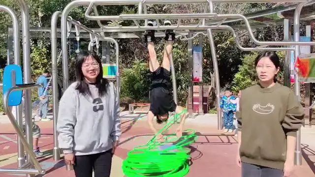 Video thumbnail for Most hula hoops spun whilst suspended upside down - 33 by Yan Yanjia