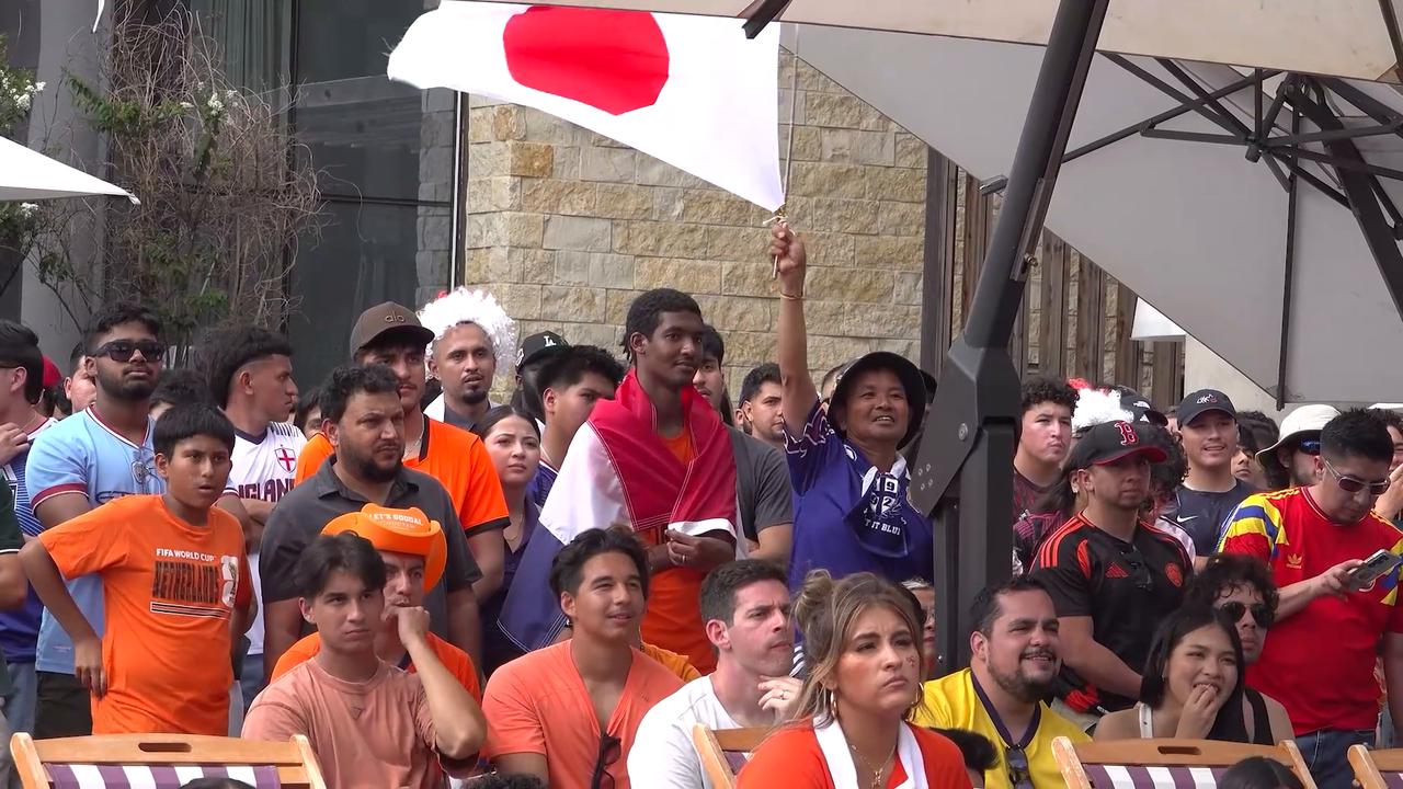 Video thumbnail for US: Japan fans celebrate equaliser against Netherlands at Arlington fan zone.