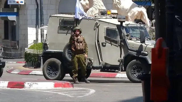 'Video thumbnail for Child among 58 Palestinians wounded by Israeli army raid in Ramallah'