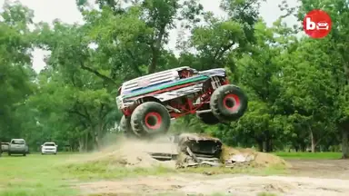 'Video thumbnail for 10,000lb Monster Truck Attempts Stunt'