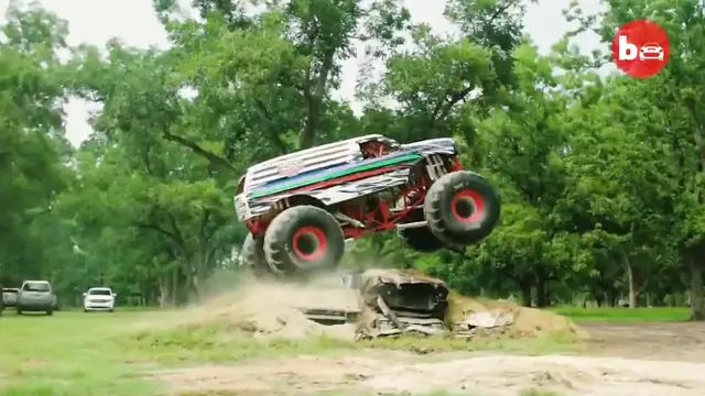 'Video thumbnail for 10,000lb Monster Truck Attempts Stunt'