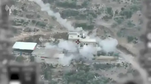 Video thumbnail for Israeli Forces Demolish Home of Suspect in Deadly March Attack.