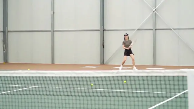 Video thumbnail for China: Chinese-developed AI tennis robots ace the game.