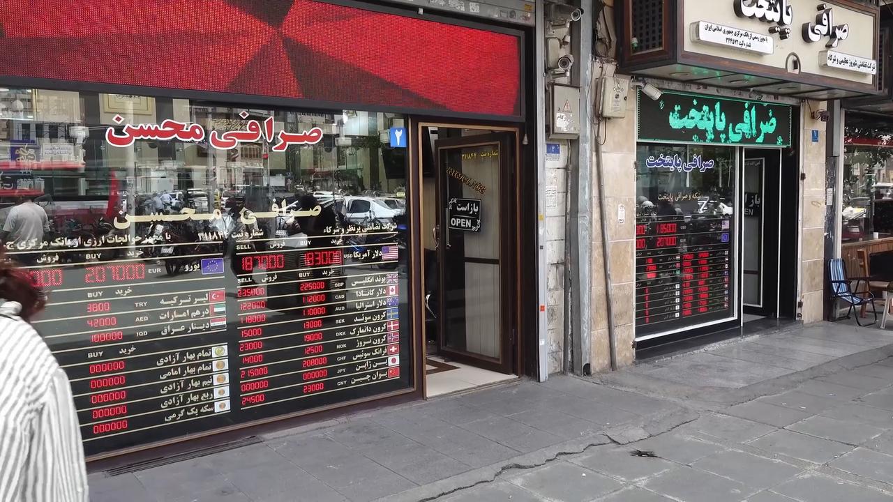 Video thumbnail for Iran: US dollar hits record high against Iranian currency amid US sanctions.