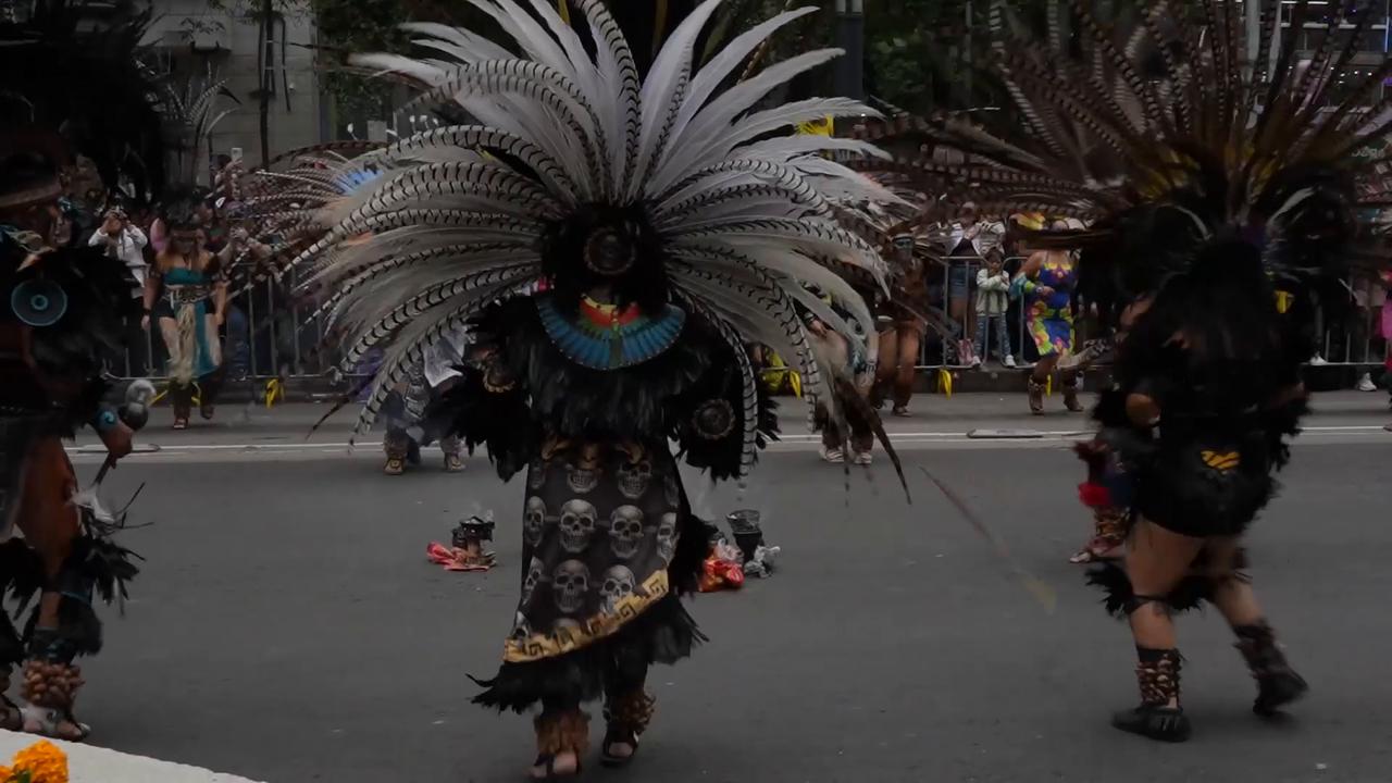 Video thumbnail for Mexico: Day of the Dead parade held in Mexico City as part of World Cup events.